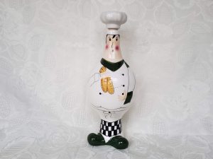 Trisa Male Chef Holding Bread Bottle